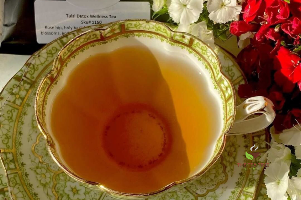 a teacup with tulsi detox tea inside