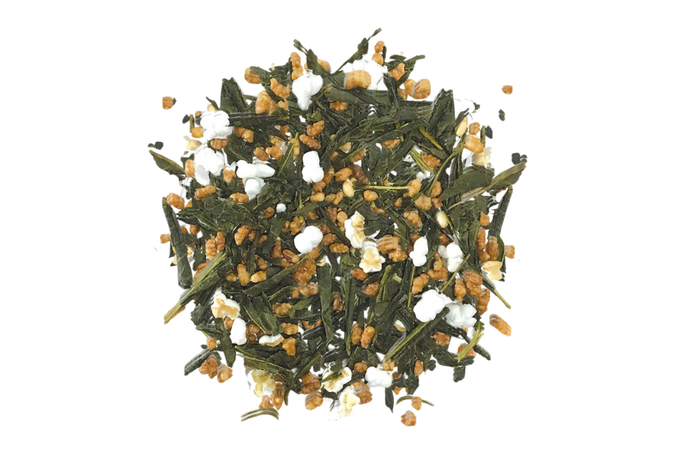 Heap of green tea leaves with small white popped corn and kernels on a white background