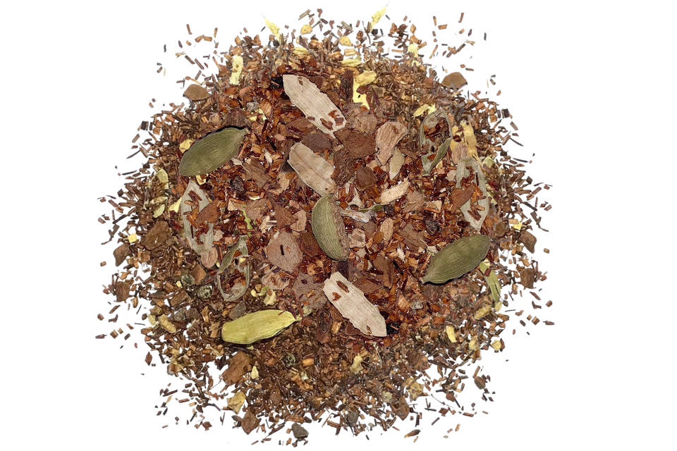Spice mix with cardamom pods on a white background