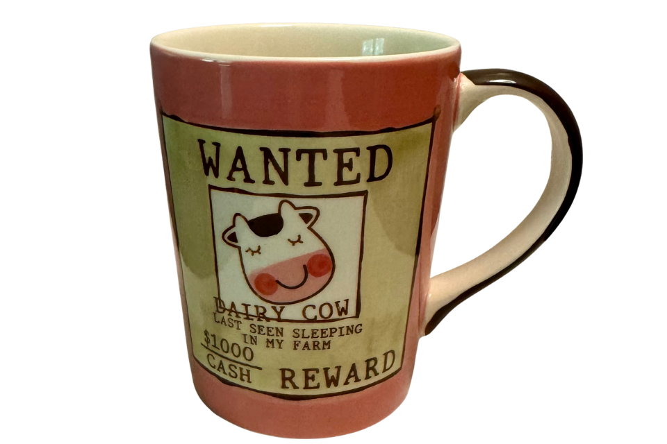 Mug with a 'Wanted' poster design featuring a cow on a white background