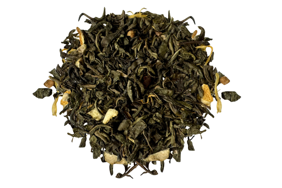 Green tea leaves with yellow flowers on a white background.