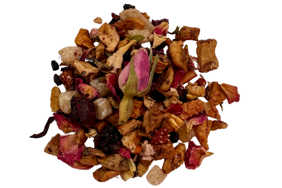 A variety of dried fruit pieces and floral petals, indicative of the ingredients in a fruit tisane tea blend.