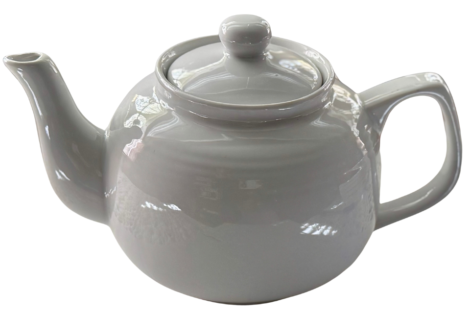 White teapot. The Tea Time Shop