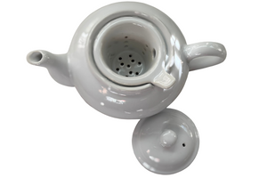 White teapot. The Tea Time Shop