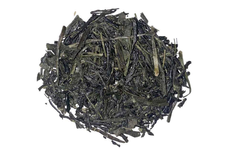 A pile of dry Gyokuro green tea leaves.