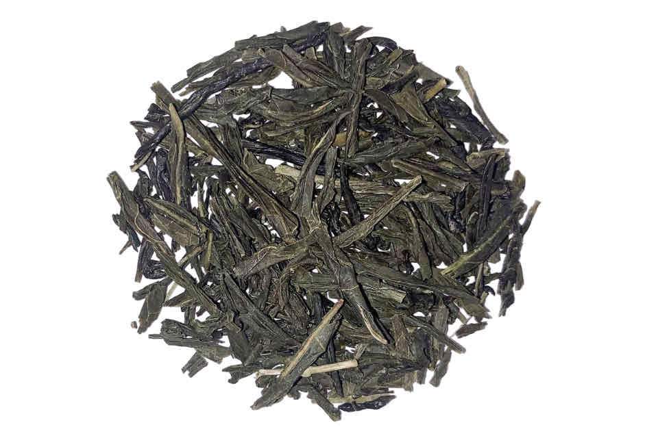 A pile of Japanese Sencha green tea leaves.