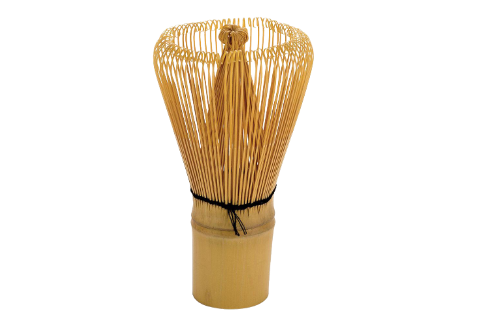 a bamboo matcha chasen whisk on a white background