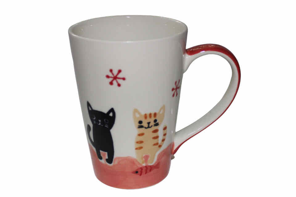 A hand-painted ceramic teacup with a design featuring cats, a cup, and a saucer.