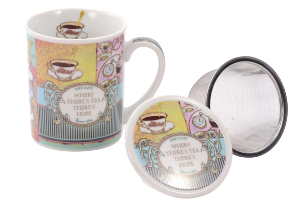 A porcelain teacup with a hand-painted design, including a cup with a handle and a lid, presented next to a transparent infuser basket.