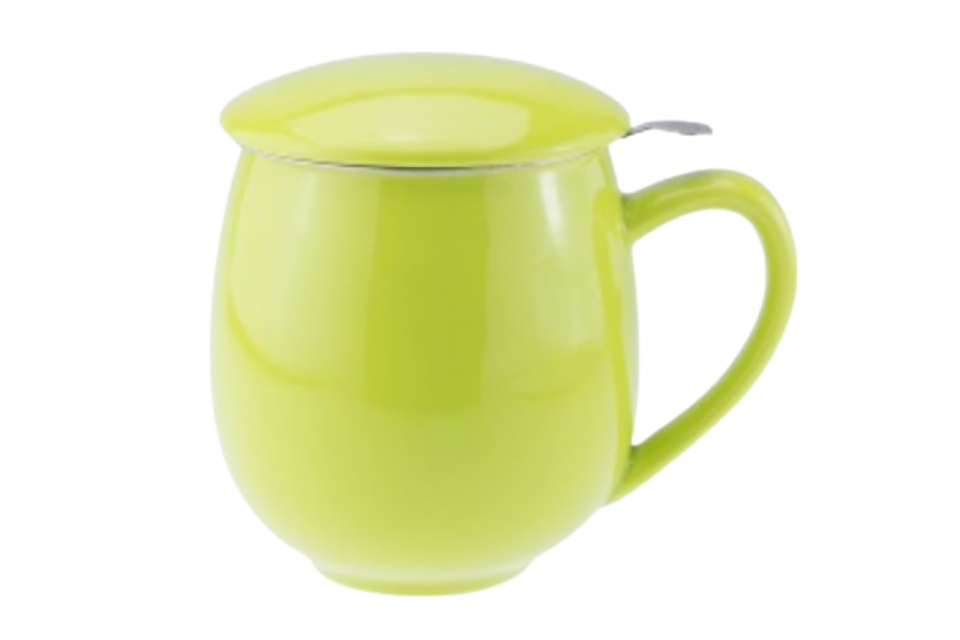 A green porcelain teacup with a lid and infuser, on a plain background.