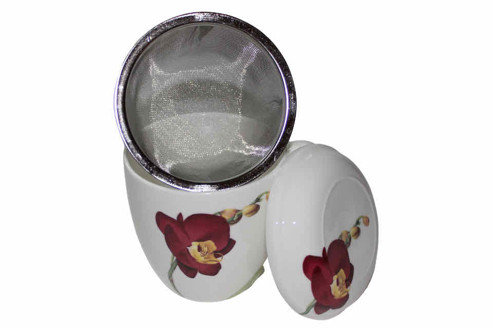 A bone china teacup with a hand painted red orchid hand-painted, infuser basket and a lid with a hand-painted orchid.
